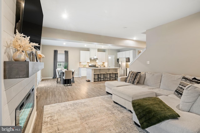 living room featuring light wood-type flooring