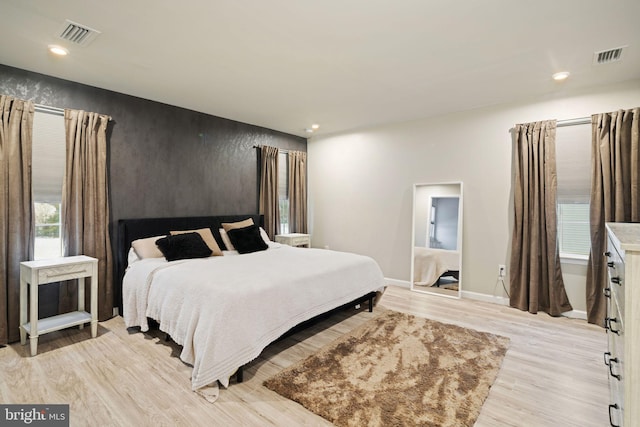 bedroom featuring light hardwood / wood-style flooring