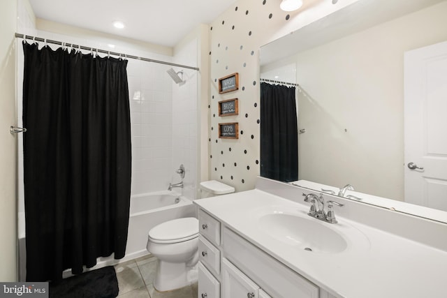 full bathroom with vanity, toilet, tile patterned flooring, and shower / bath combo