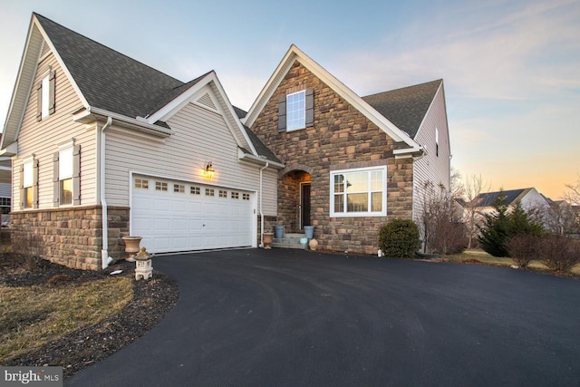 view of front of house with a garage