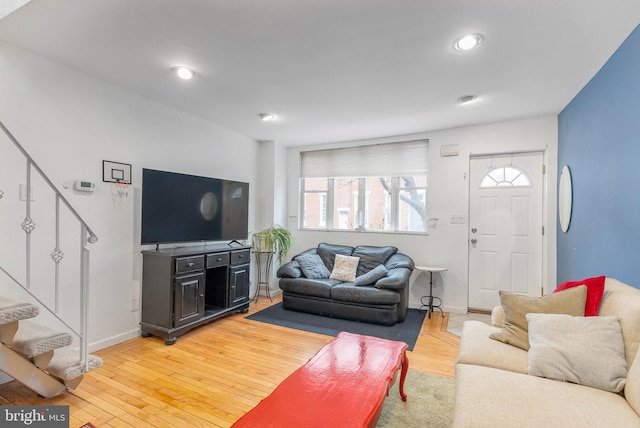 living room with light hardwood / wood-style floors