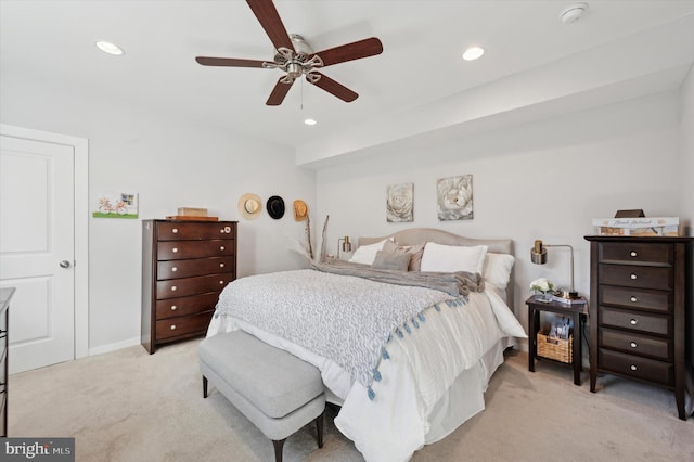 bedroom featuring recessed lighting, light colored carpet, ceiling fan, and baseboards