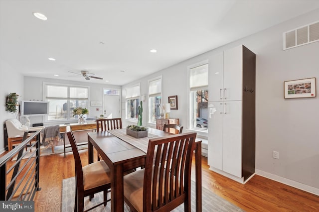 dining area featuring visible vents, baseboards, light wood-style flooring, ceiling fan, and recessed lighting