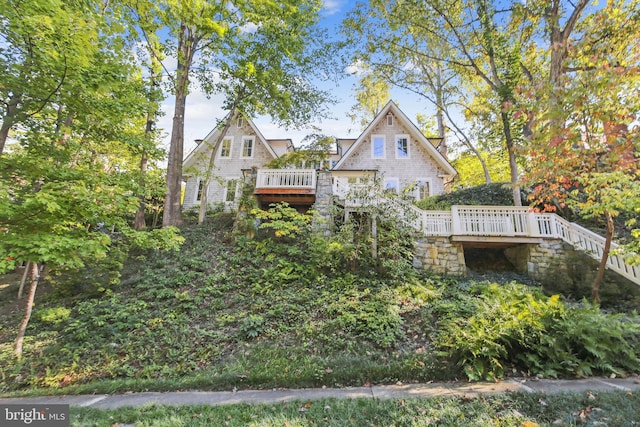 view of front of house featuring a deck