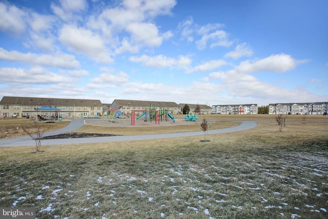 community play area with a yard