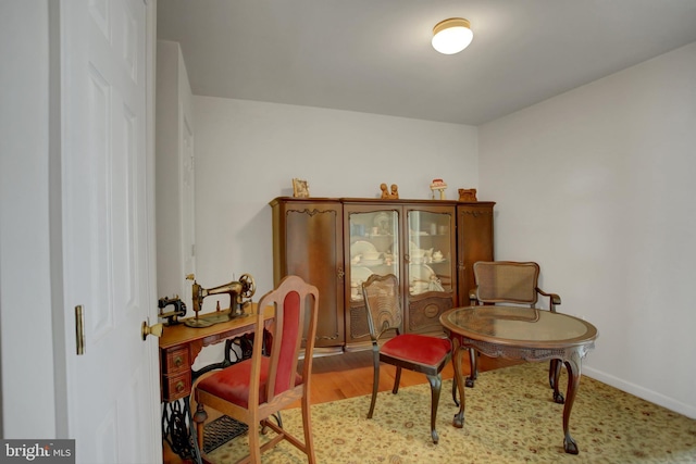 interior space with light wood finished floors and baseboards