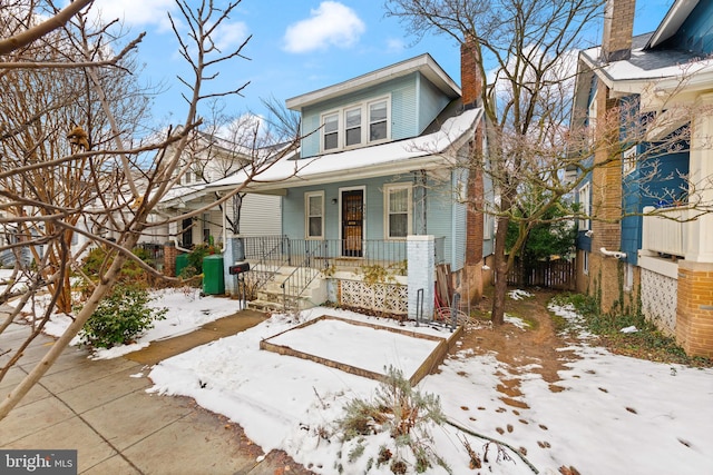 bungalow-style home featuring a porch