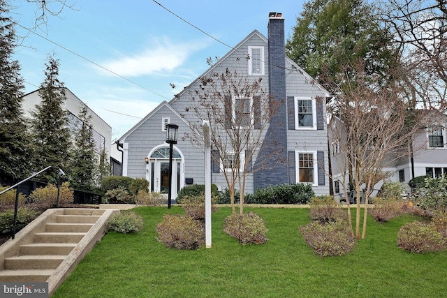 view of front of home with a front yard