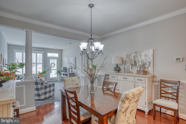 103 Candor Ln, Dover, DE 19901 - dining room with crown molding, wood-type flooring, and decorative columns
