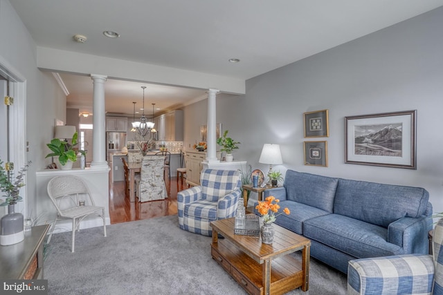 103 Candor Ln, Dover, DE 19901 - living area with crown molding, a notable chandelier, and ornate columns