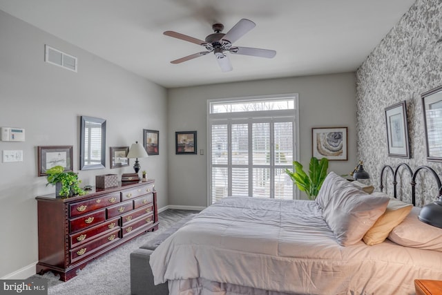 103 Candor Ln, Dover, DE 19901 - carpeted bedroom featuring wallpapered walls, baseboards, visible vents, and ceiling fan