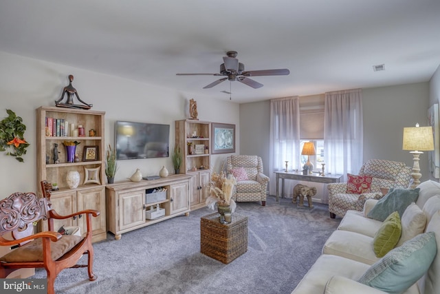 103 Candor Ln, Dover, DE 19901 - carpeted living room featuring visible vents and a ceiling fan
