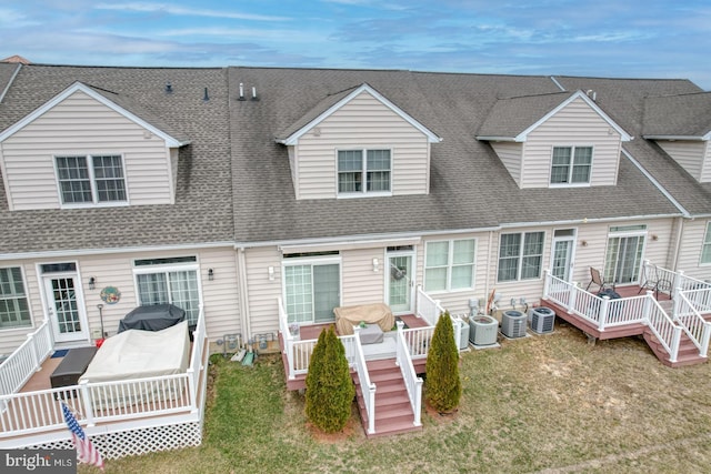 103 Candor Ln, Dover, DE 19901 - back of house with a yard, central AC unit, roof with shingles, and a wooden deck