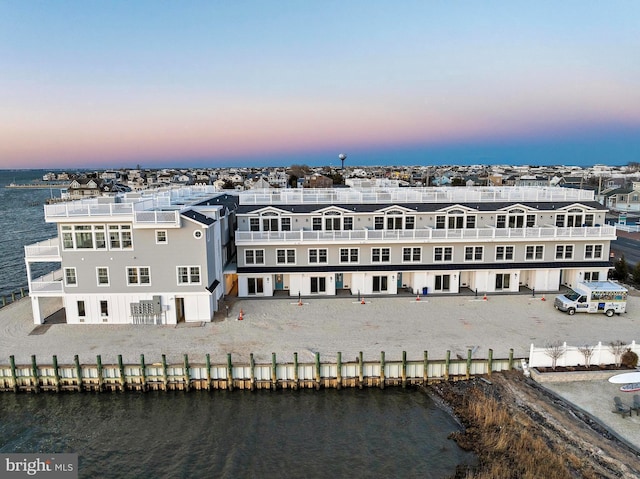 bird's eye view with a water view