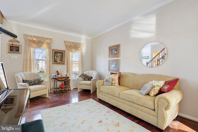 living room featuring ornamental molding and dark hardwood / wood-style floors