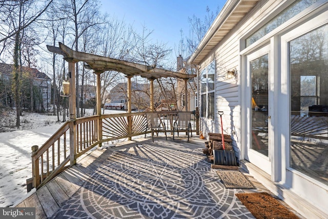 view of snow covered deck