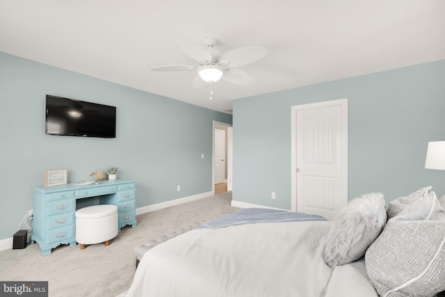 bedroom with light carpet and ceiling fan