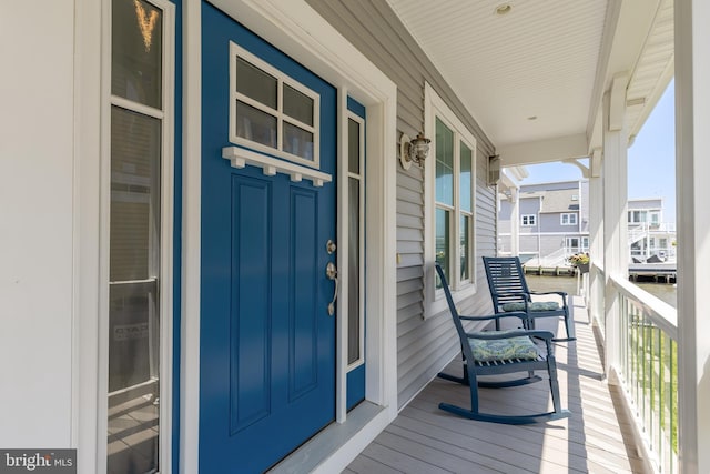 doorway to property featuring a porch