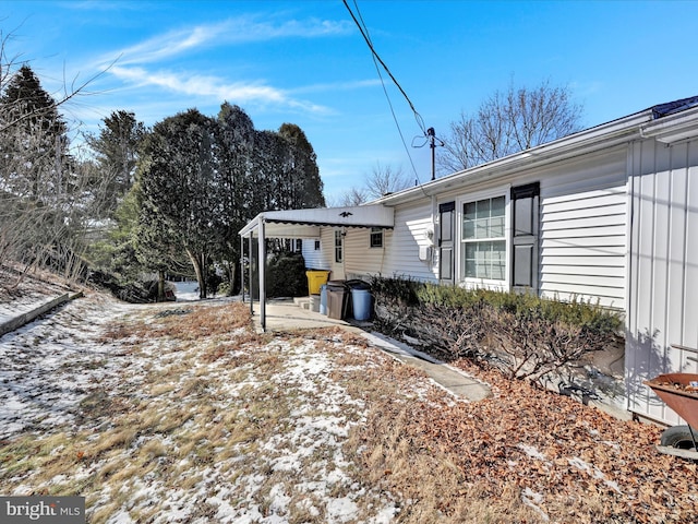 view of yard covered in snow