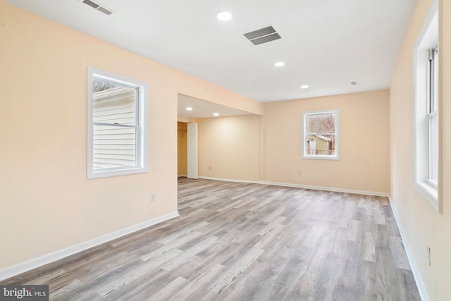 empty room with light wood-type flooring