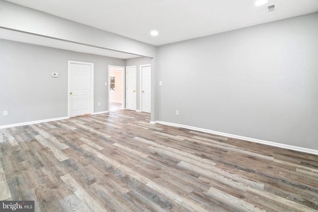 spare room featuring light wood-type flooring