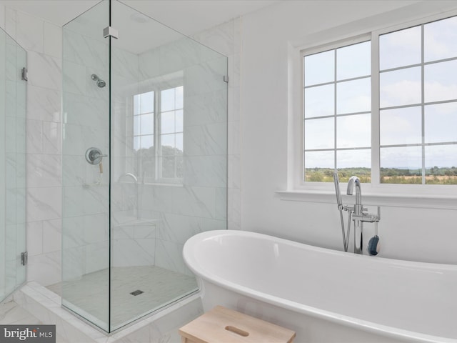 bathroom with independent shower and bath