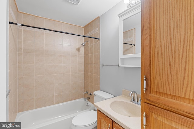 bathroom with shower / bathtub combination, visible vents, vanity, and toilet