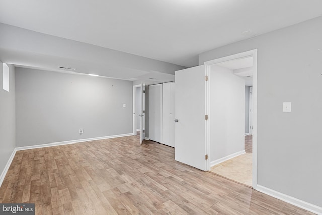 interior space with light wood-style flooring and baseboards