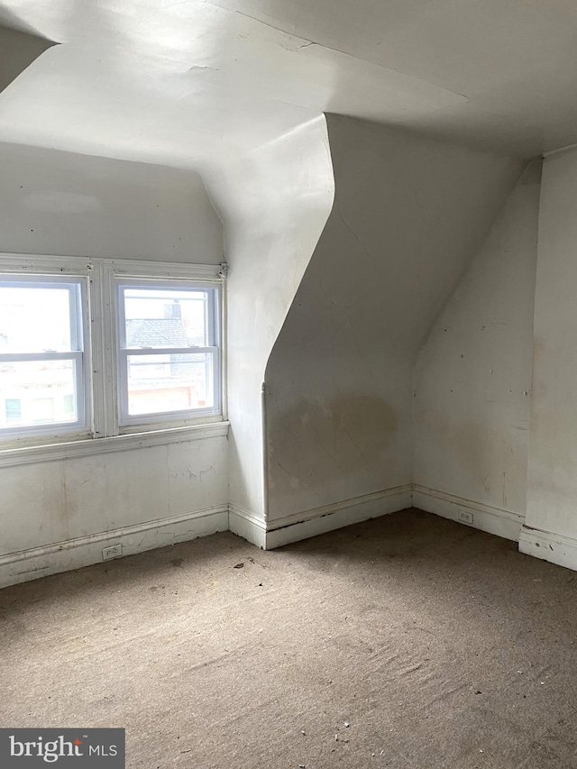 bonus room with vaulted ceiling