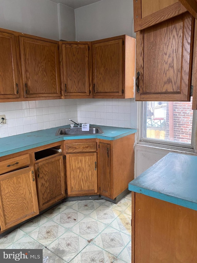 kitchen with sink and backsplash