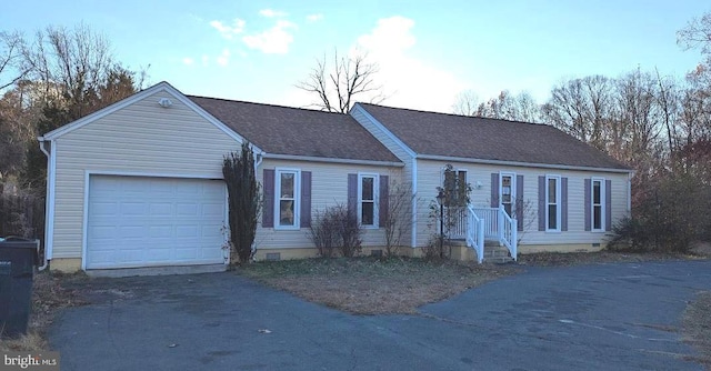 ranch-style house with a garage