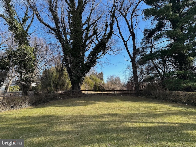 view of yard with fence