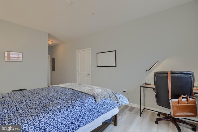 bedroom with light wood-type flooring