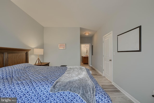 bedroom with light wood-type flooring