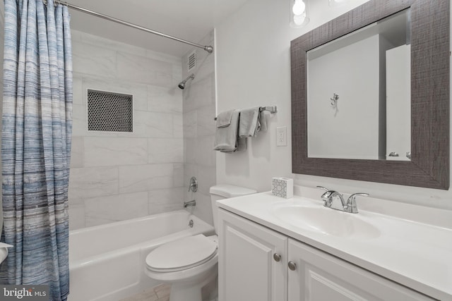 full bathroom with shower / bath combination with curtain, vanity, and toilet