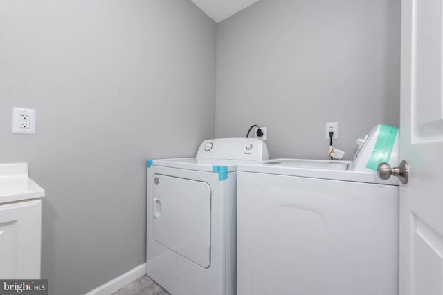 laundry room with independent washer and dryer