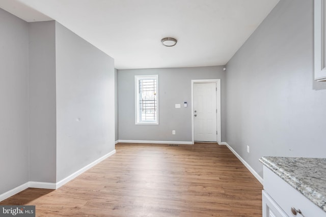 entrance foyer with light wood-type flooring