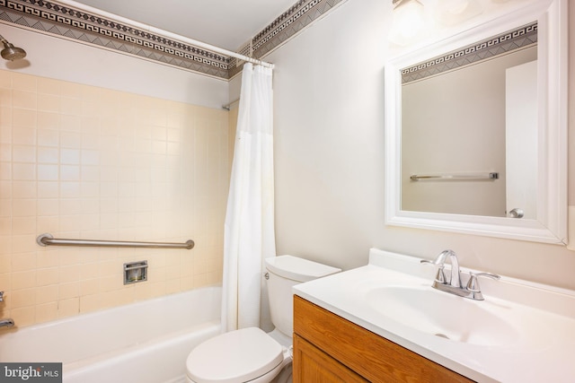 bathroom featuring toilet, vanity, and shower / bathtub combination with curtain