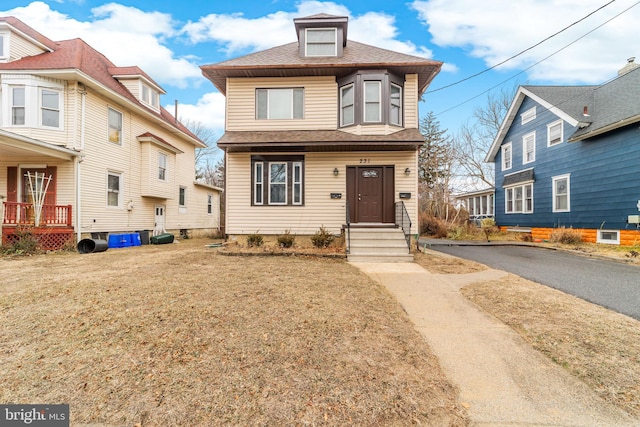 front of property featuring a front lawn