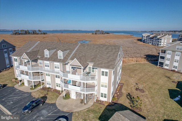 aerial view featuring a water view