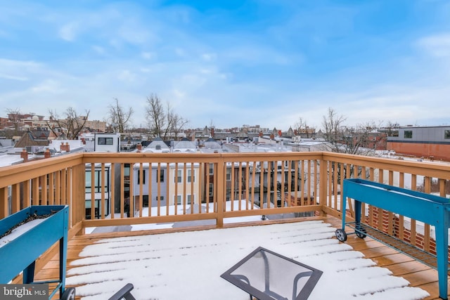 view of snow covered deck