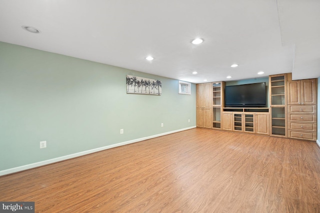 unfurnished living room with light hardwood / wood-style floors