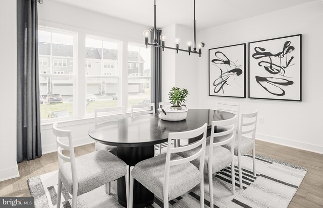 10820 Willow Ter, Fairfax, VA 22030 - dining space featuring wood-type flooring and a chandelier