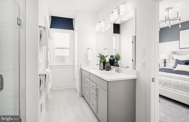 10820 Willow Ter, Fairfax, VA 22030 - bathroom featuring vanity and a shower with door