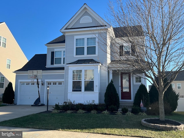 view of front facade featuring driveway, an attached garage, and a front yard