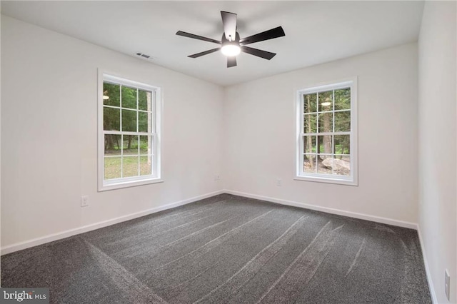 carpeted empty room with ceiling fan