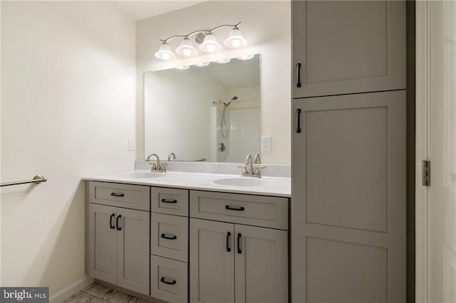 bathroom featuring vanity and walk in shower