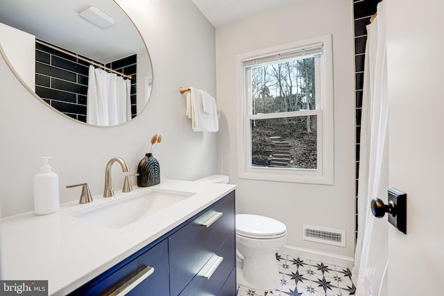 full bathroom with visible vents, a shower with shower curtain, toilet, tile patterned floors, and vanity