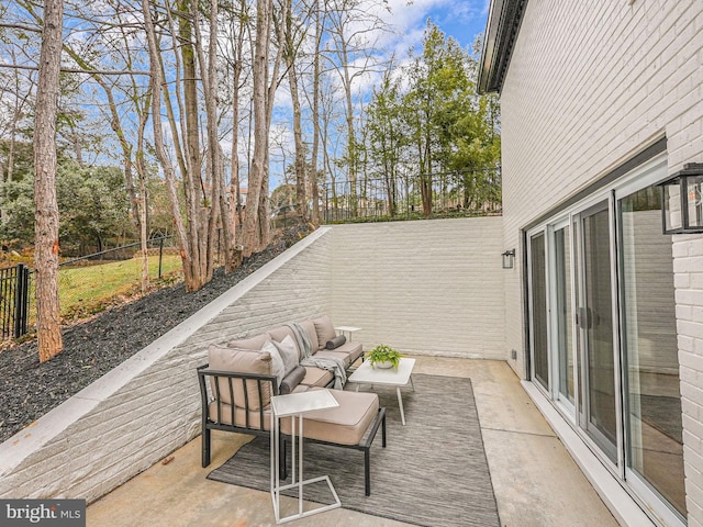 view of patio featuring fence and outdoor lounge area