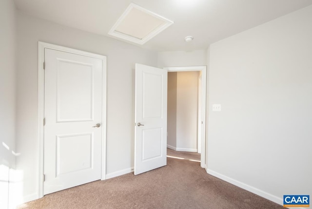 unfurnished bedroom with carpet floors